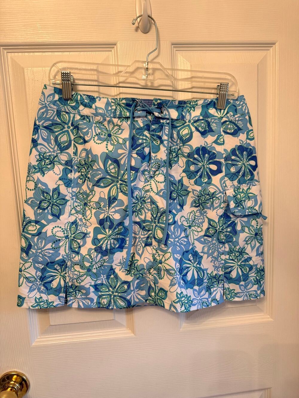 New” Title Nine”blue and white floral athletic skort tie-waist and side pockets.
